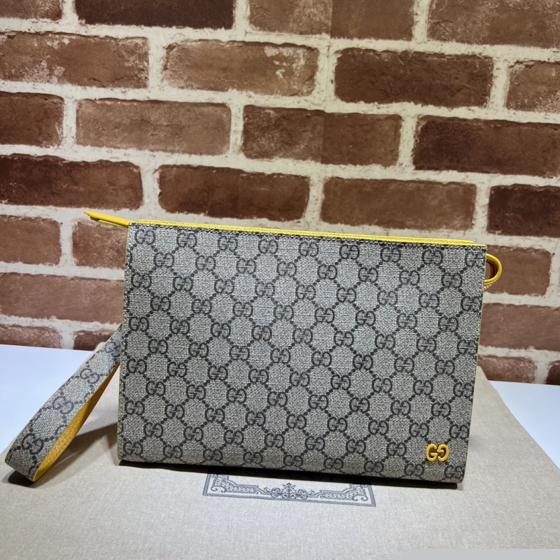 G*u*i clutch bags